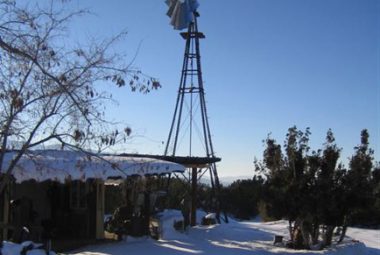 Film This Location ranch view snow with windmill